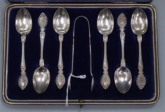 A cased set of silver teaspoons and sugar tongs